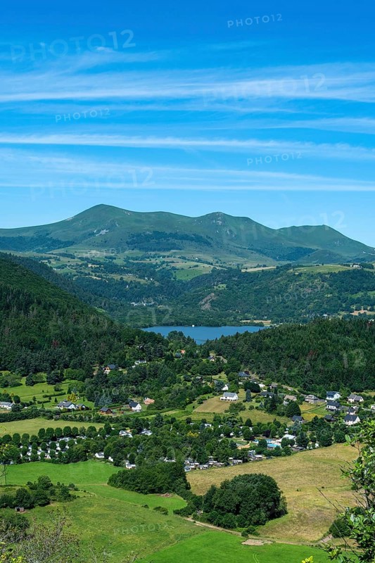 Panoramic view of Lake Chambon and the Sancy massif in the Auvergne Volcanoes Regional Natural Park, Puy-de-Dôme, Auvergne Rhone Alpes, France, Europe