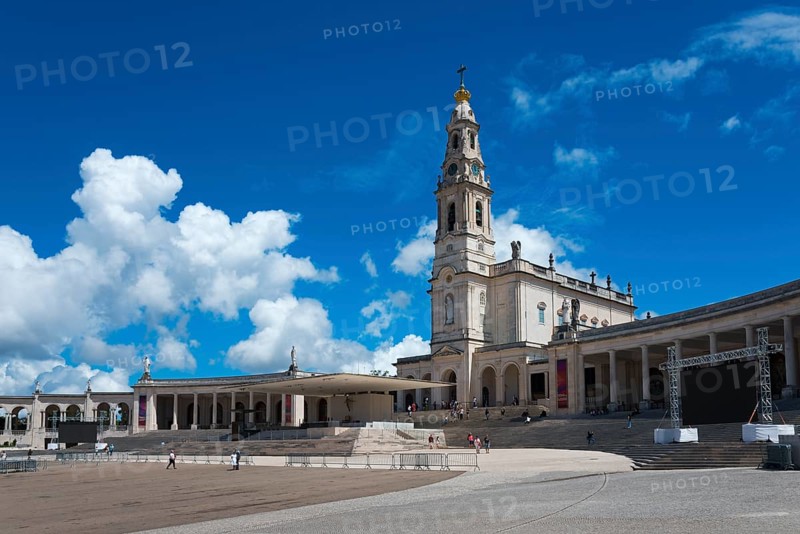 Spacious square with an imposing bell tower and surrounding colonnades under a blue sky, Basilica of Our Lady of the Rosary, Santuario de Fatima, place of pilgrimage, Fatima, Fátima, Ourem, Santarem, Portugal, Europe