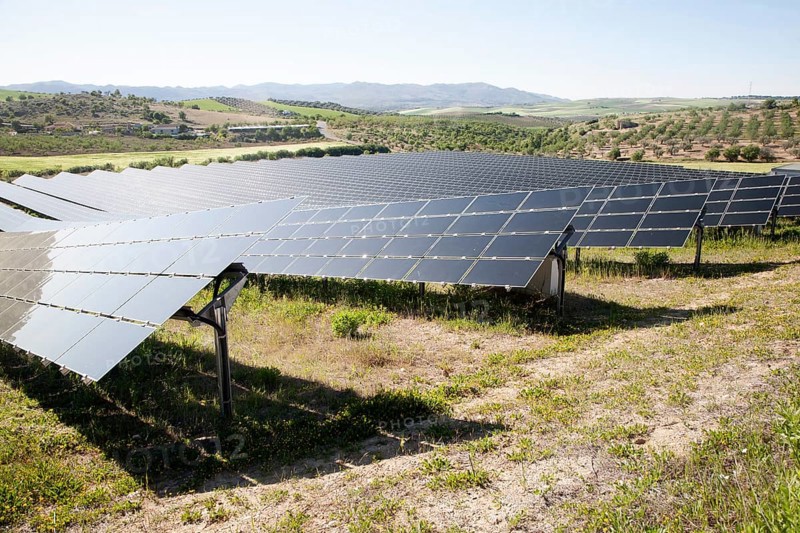 Array of photovoltaic solar panels in Mediterranean sunshine, near Alhama de Granada, Spain, Europe