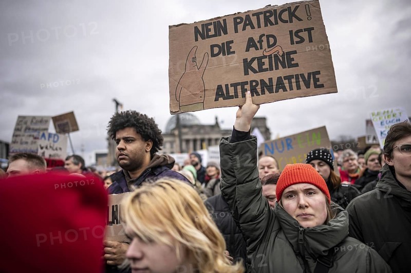 150, 000 people gather around the Bundestag in Berlin to build a human wall against the shift to the right in society. We are the firewall chanted demonstrators from a wide range of social groups. Recordings on 03.02.2024 in Berlin