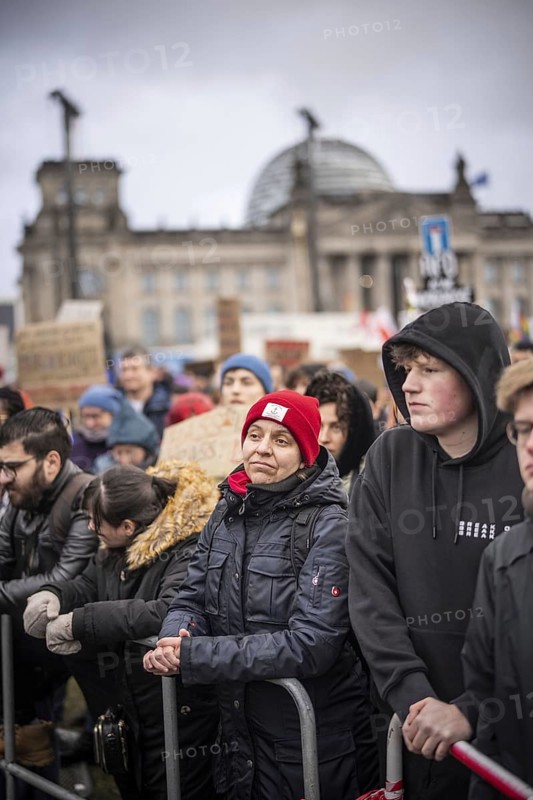150, 000 people gather around the Bundestag in Berlin to build a human wall against the shift to the right in society. We are the firewall chanted demonstrators from a wide range of social groups. Recordings on 03.02.2024 in Berlin