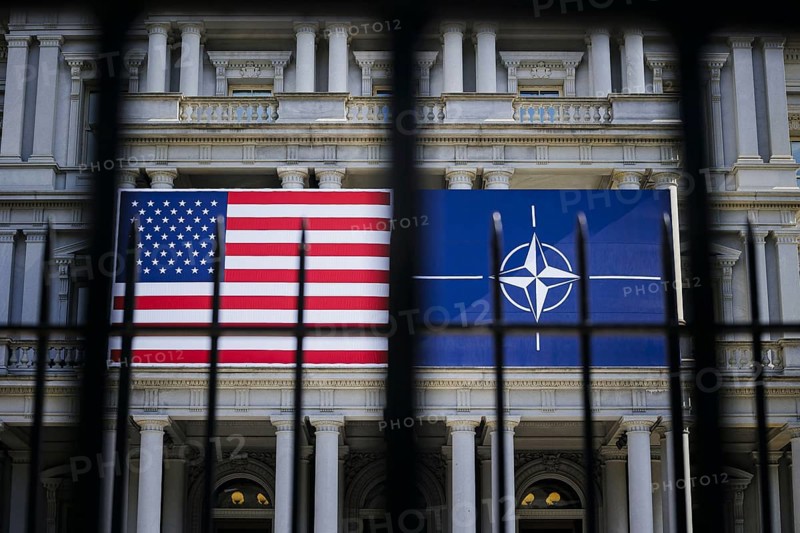 The flags of the USA and NATO hang on a building in Washington on the sidelines of the NATO summit. Washington, 09.07.2024