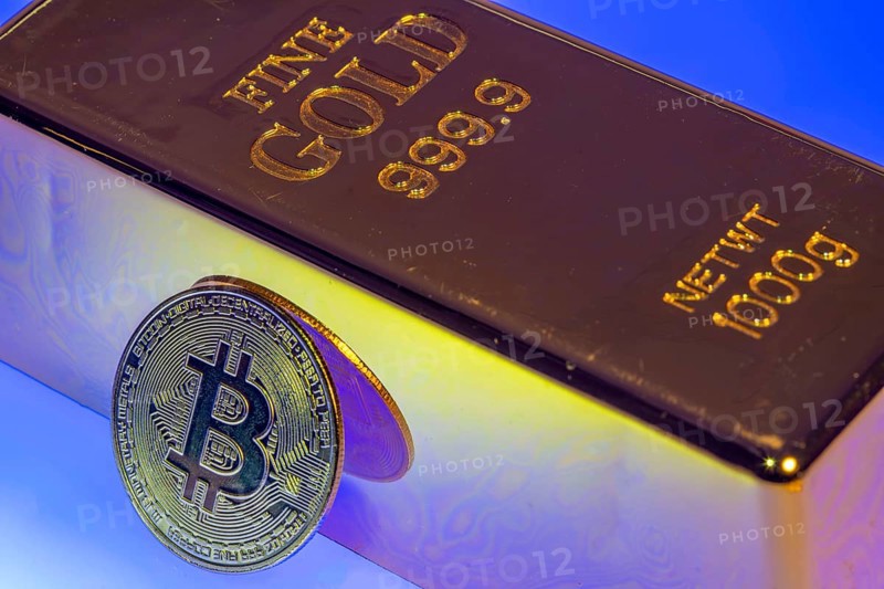Cryptocurrency, gold bar, guarantor for analogue currencies, symbol coin, optical placeholder for the digital currency, blockchain, stock market prices