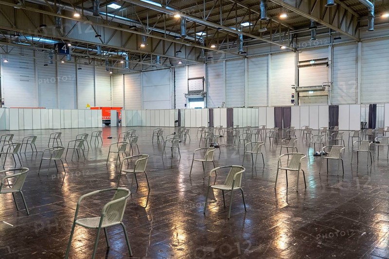 Construction of a vaccination centre for corona vaccinations, in a hall at Messe Essen, by the city, the fire brigade and various aid organisations, construction of 12 vaccination lines for a daily vaccination of up to 2400 people, operated by the North Rhine-Westphalia Association of Statutory Health Insurance Physicians, waiting area after vaccination, for vaccination compatibility