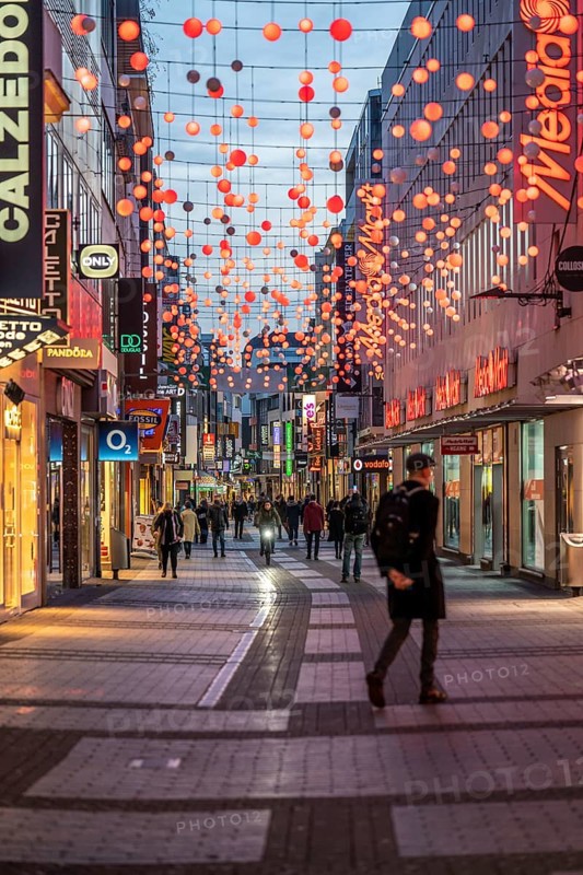 First day of the Christmas lockdown in the Corona crisis, empty shopping street Hohe Straße, closed shops, hardly any passers-by, police patrol cars, in Cologne, North Rhine-Westphalia, Germany, Europe