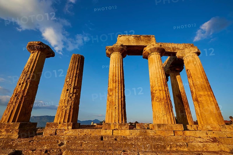 Archaic Temple of Apollo, Doric columns, Contrasting view of ancient architectural elements against a clear sky at sunset, Archaeological site, Archea Korinthos, Corinth, Peloponnese, Greece, Europe