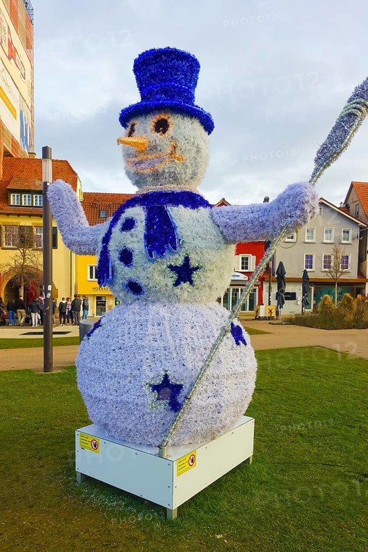 Snowman with hat, carrot nose, broom, top hat, scarf, illuminated figurine, mouth, eyes, funny winter motif, Christmas motif, Christmas, Christfest, Advent season, winter time, blue, cold, Advent season, Christmas decoration, Christmas card motif, Reutlingen, Baden-Württemberg, Germany, Europe