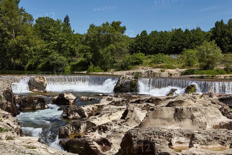 The cascades of Sautadet consist of limestone cliffs and are crossed by the river Cèze in La Roque-sur-Cèze, Département Gard, Occitanie region, France, Europe