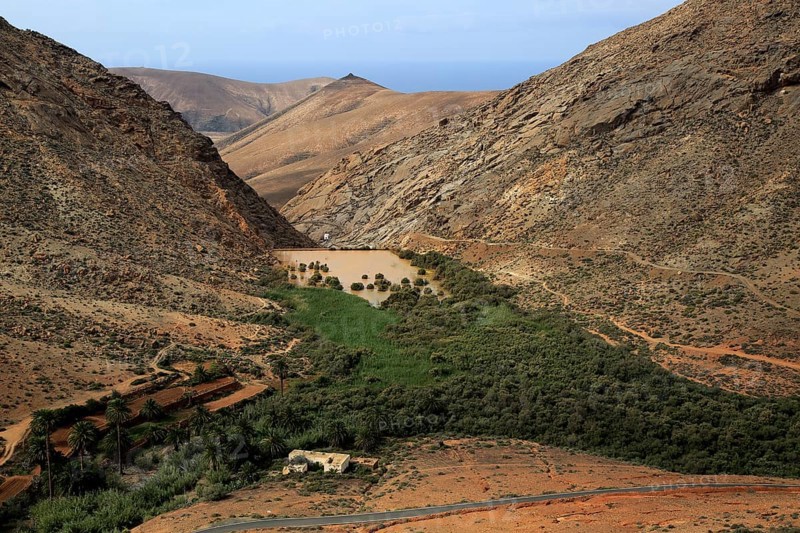 Dam and reservoir partially silted up by sediment, Presa de la Penitas, Fuerteventura, Canary Islands, Spain, Europe