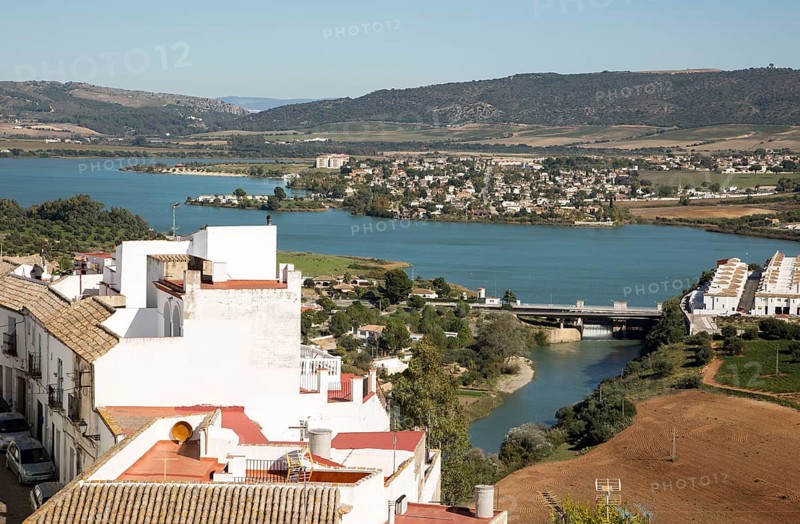 Reservoir lake occupying flooded valley land, village of Arcos de la Frontera, Cadiz province, Spain, Europe
