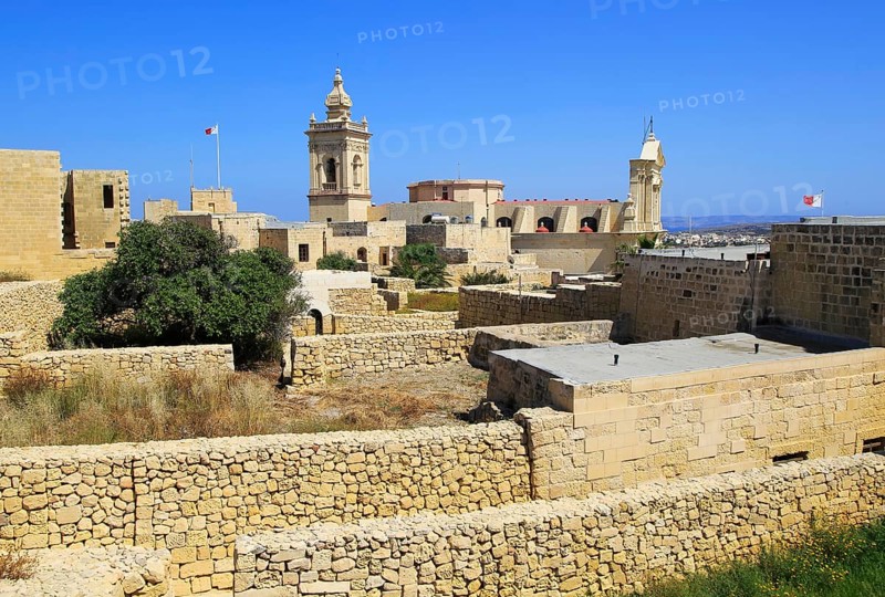 Cathedral church tower and ruins inside citadel castle walls Il-Kastell, Victoria Rabat, Gozo, Malta, Europe