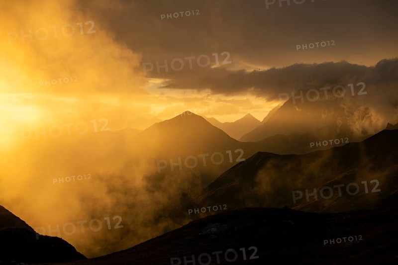 Montafon mountains with dramatic cloudy sky at sunset, Tschagguns, Rätikon, Montafon, Vorarlberg, Austria, Europe