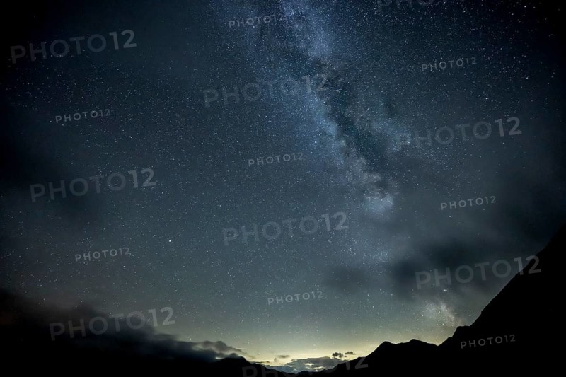 Milky Way and starry sky with Montafon mountains, Tschagguns, Rätikon, Montafon, Vorarlberg, Austria, Europe