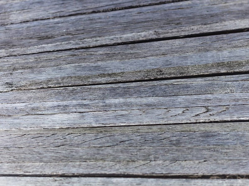 Old dirty wooden gray-brown texture in the park