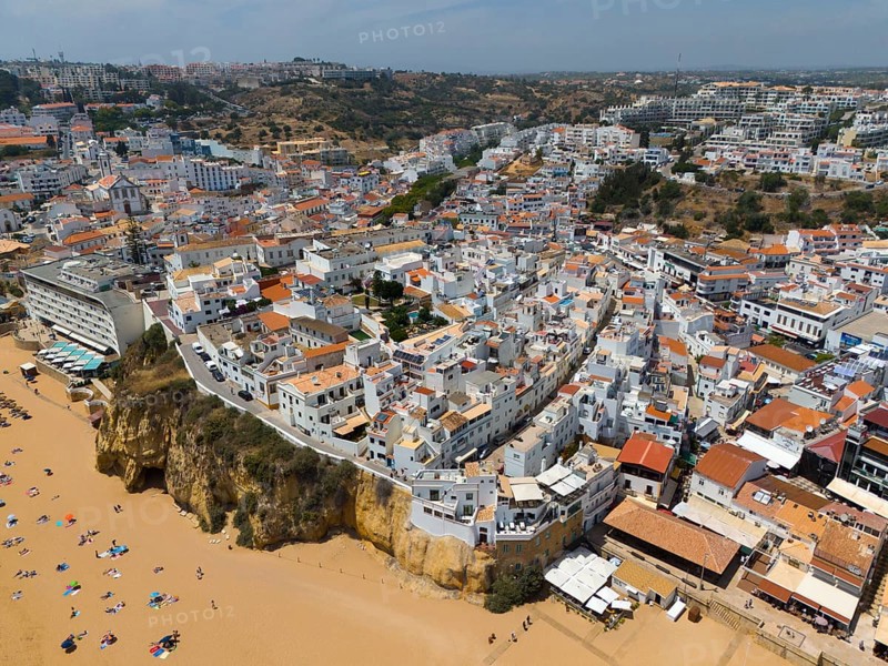 Coastal town with many white buildings on cliffs on the beach, sandy beach with bathers, aerial view, Albufeira, Faro, Algarve, Portugal, Europe