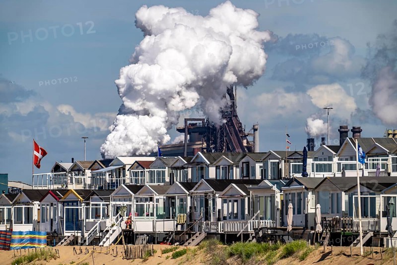 The Tata Steel steel and smelting works in IJmuiden, Velsen, North Holland, Netherlands, largest industrial area in the Netherlands, 2 blast furnaces, 2 coking plants, rolling mills, directly on the North Sea, beach houses near Ijmuiden aan Zee