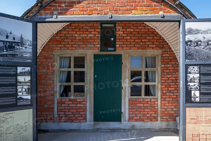 Nissen hut, prefabricated housing for immigrant workers at Le Bois du Cazier, coal mining museum at Marcinelle near Charleroi, Hainaut, Belgium, Europe