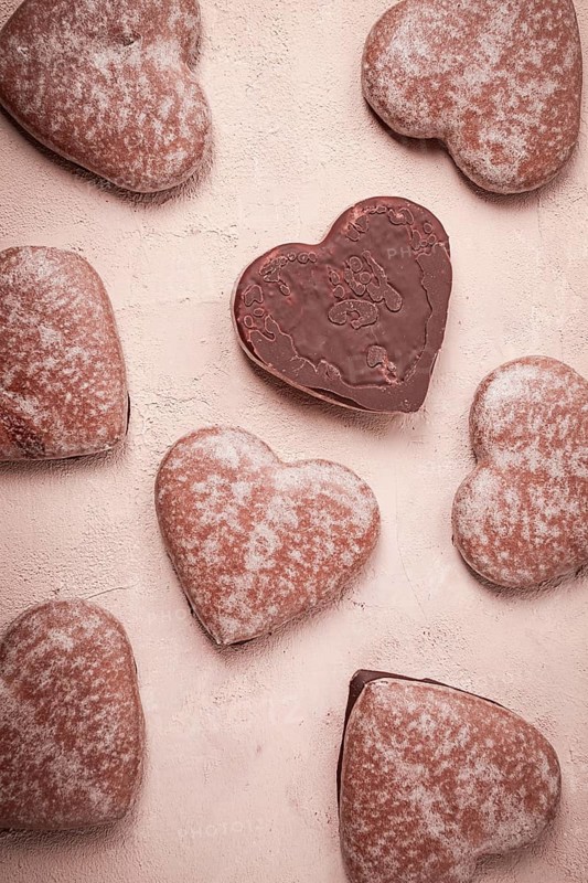 Food wallpaper, chocolate glazed gingerbread, heart-shaped, top view, no people