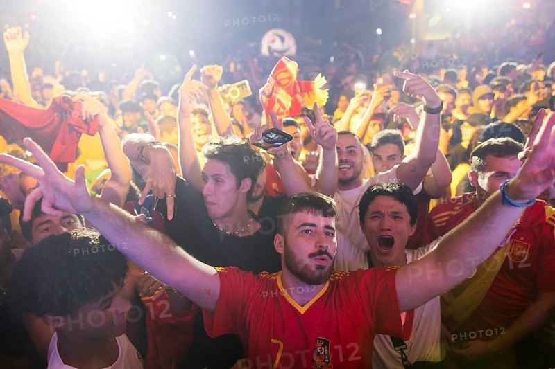 Fans of the Spanish team celebrate the European Championship title after the 2:1 victory against England at the Adidas fan zone at the Bundestag after the final match between Spain and England at the European Football Championship, Berlin, 14 July 2024