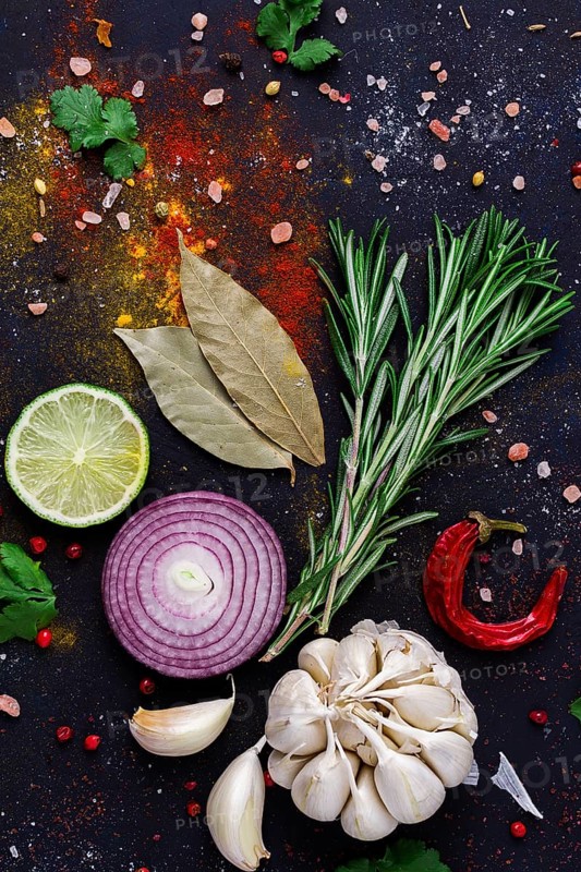 Food background, set of spices and herbs, on a dark background, concept, top view, no people