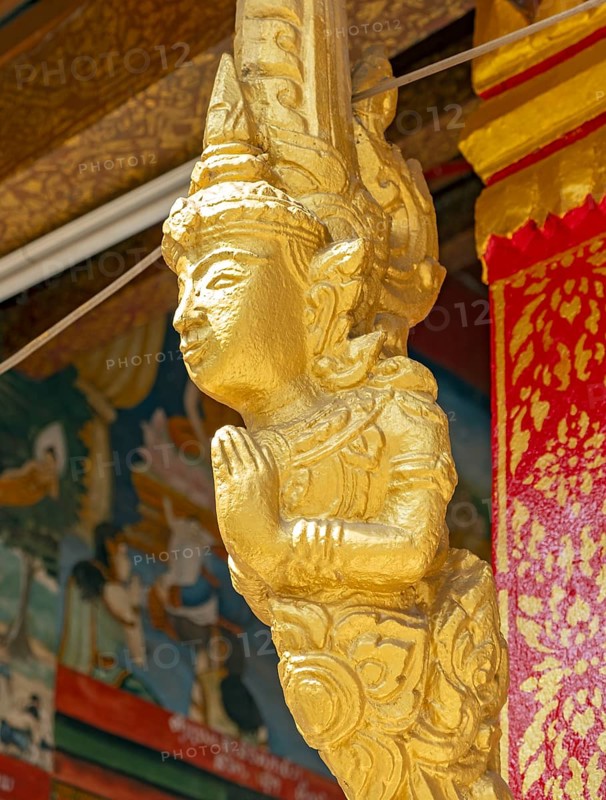 Gilded deity statue, Wat Phonxay, Luang Prabang, Laos, Asia