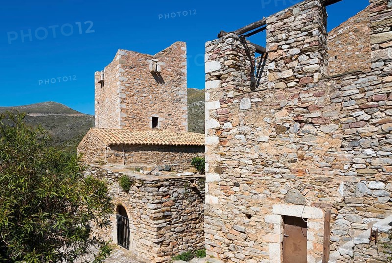 Two stone buildings of a historic village structure under a clear sky, residential towers, Vathia, Ithylo, Anatoliki Mani, Mani, Laconia, Peloponnese, Greece, Europe