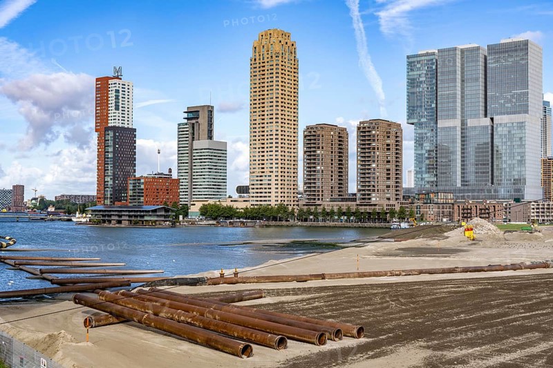 The Rijnhaven, a 28-hectare harbour basin, has now been filled in by almost a third to create space for up to 3, 000 flats, there will be an artificial beach, a floating park connected by jetties, restaurants and shops, cultural facilities, a major urban development project in the old harbour, the Rijnhaven borders on the popular Kop van Zuid and Katendrecht districts, Rotterdam, Netherlands