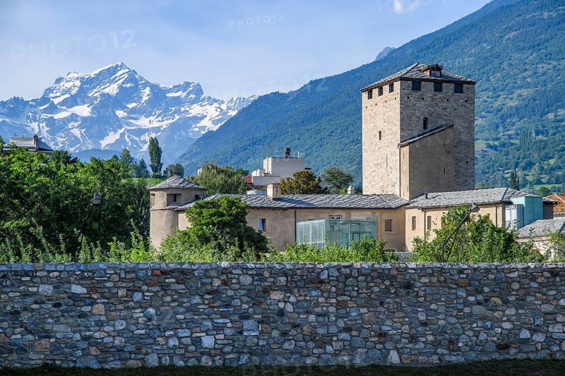 View of historic former prison until 1984 prison prison complex with historic Balvi tower prison tower dungeon, in the background mountain range mountains of high Alps, Aosta, Valle d'Aosta, Vallee d'Aoste, Italy, Europe