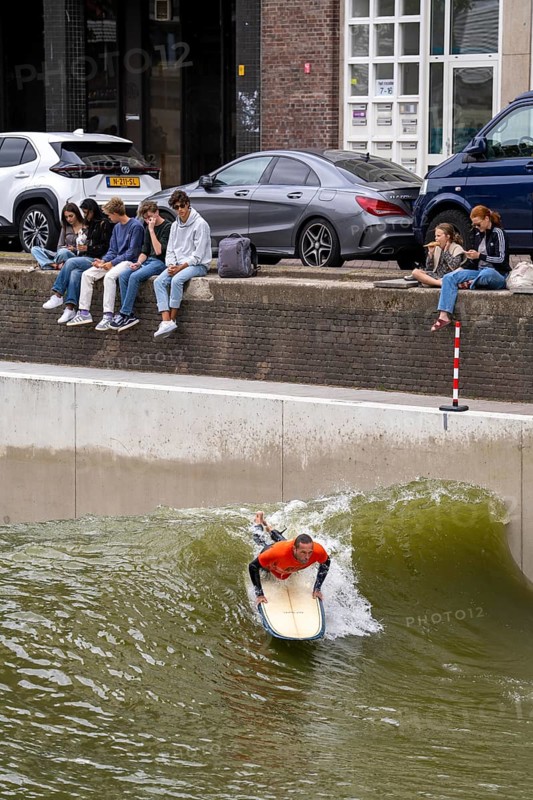 Surfing facility in the city centre of Rotterdam, Rif010, supposedly the world's first wave facility for surfers in a city, in the Steigersgracht, a 130 metre long and 21 metre wide wave pool was built in the existing canal, waves up to 1.5 metres high can be generated, every 7 seconds a wave breaks for the surfers, the 4.5 million litres in the pool, water is moved by 8 wave machines, Netherlands