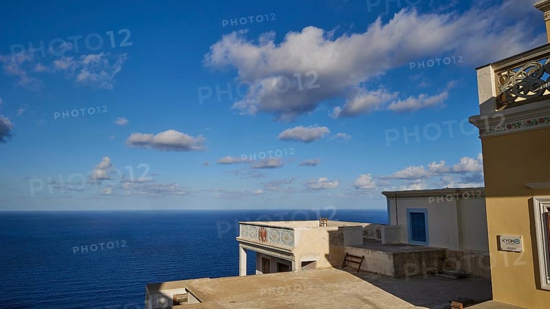 View of the vast sea and sky from a building with balcony, Colourful mountain village, Morning light, Olymbos, Karpathos, Dodecanese, Greek Islands, Greece, Europe