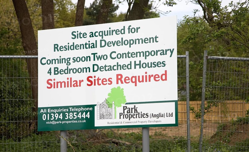 Building site notice for residential development similar sites wanted for construction of houses, Playford, Suffolk, England, United Kingdom, Europe