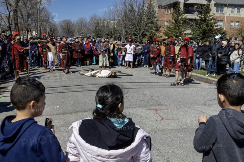 Detroit, Michigan, The Stations of the Cross are portrayed, in Spanish, on Good Friday at the Catholic Basilica of Ste. Anne. Ste. Anne was founded by French colonists in 1701. The church now serves a mostly Mexican-American community