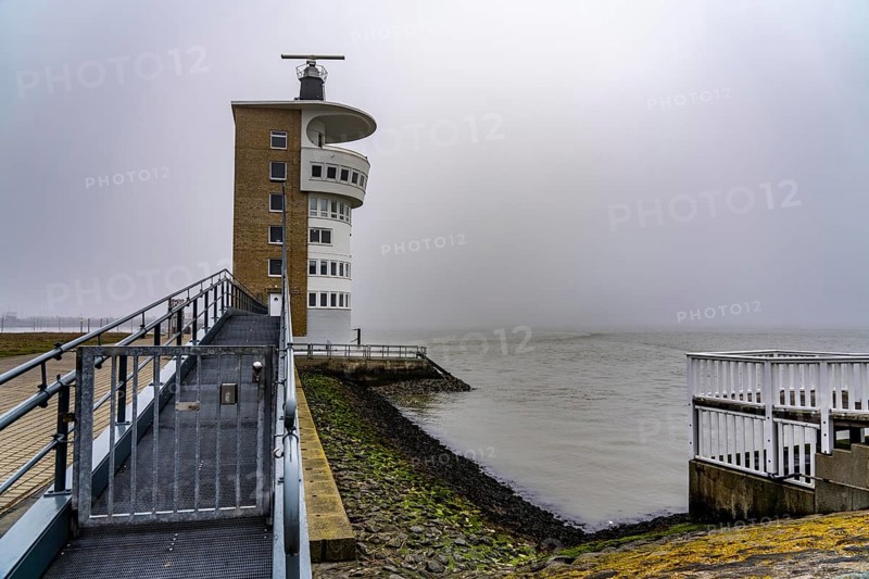 Thick fog in winter, hangs over the mouth of the Elbe into the North Sea, radar tower of the Water and Shipping Authority (WSA) Cuxhaven, viewpoint Alte Liebe in Cuxhaven, Lower Saxony, Germany, Europe