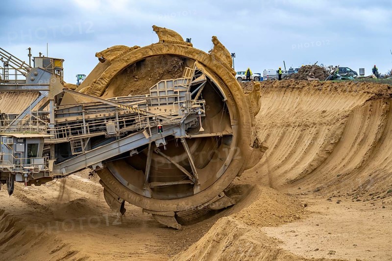 Opencast lignite mine Garzweiler 2, bucket wheel excavator 261 excavating the surface, at the rest of the hamlet Lützerath, bucket diameter is 17 metres, Erkelenz, North Rhine-Westphalia, Germany, Europe