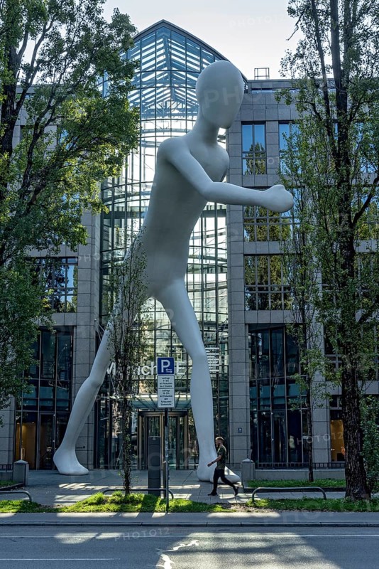 Walking Man, monumental sculpture by Jonathan Borofsky made of steel and plastic, pedestrian, walking man, human being, Munich RE insurance company, Munich Re, Leopoldstrasse, Schwabing, Munich, Upper Bavaria, Bavaria, Germany, Europe
