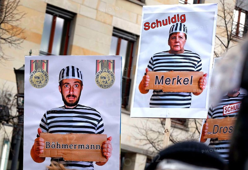 Posters show Chancellor Merkel and Jan Böhmermann in convict clothing. Once again, thousands of corona deniers are demonstrating against the restrictions in the pandemic. The police broke up the demonstration for not observing social distancing rules and not wearing mouth and nose protection, Berlin, 18 November 2020