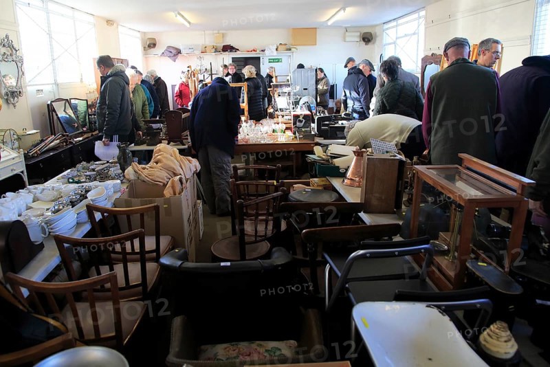 Furniture and household goods on sale at traditional country auction, Campsea Ashe, Suffolk, England, UK