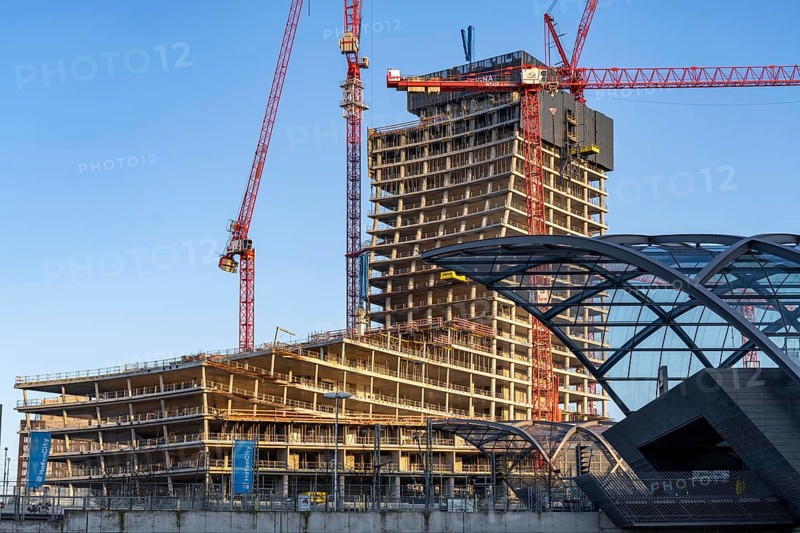 Shell of the Elbtower construction project, the architectural completion of Hafencity Hamburg, in the east, is to grow to 64 storeys and 245 metres in height, construction was halted due to the insolvency of Signa Prime Selection AG of the Austrian real estate entrepreneur René BenkoHamburg, Elbbrücken underground and S-Bahn station, Hamburg, Germany, Europe
