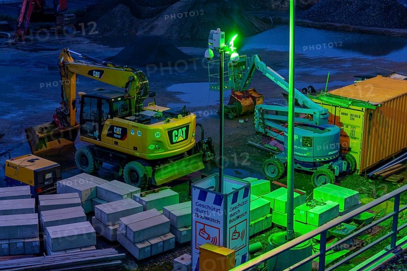 Construction site, construction material, construction tools, construction equipment, secured by BauWatch, camera surveillance, object in the green light of the surveillance camera, company for construction site security, surveillance, protection against theft and vandalism