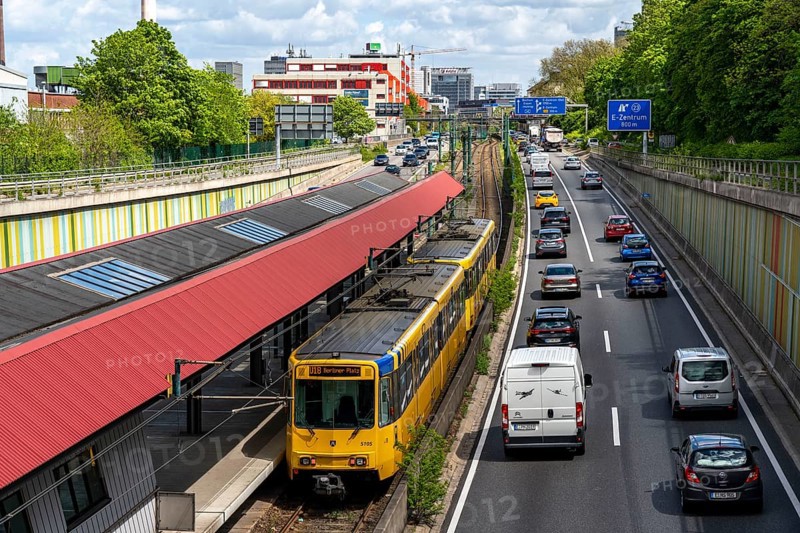 Motorway A40, Ruhrschnellweg, in the through road in Essen, noise barrier, tram, underground of the Ruhrbahn, stop Hobeisenbrücke, North Rhine-Westphalia, Germany, Europe
