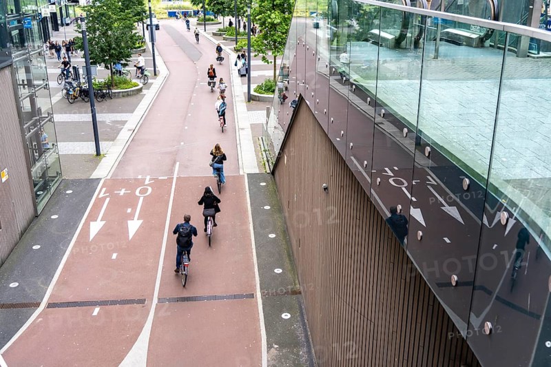 Entrance and exit of the bicycle car park at Utrecht Centraal station, Stationsplein, over 13, 000 parking spaces, considered the largest bicycle car park in the world, over 3 underground floors, Utrecht, Netherlands