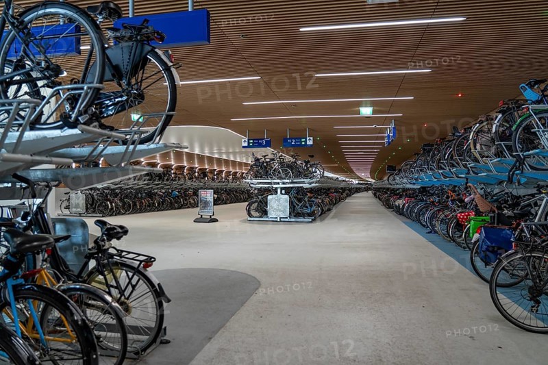New bicycle car park at Amsterdam Central Station, IJboulevard, space for around 4000 bicycles, digitally monitored, underground, direct connection to the station, built into the water of the IJ, at the back of the station, Netherlands