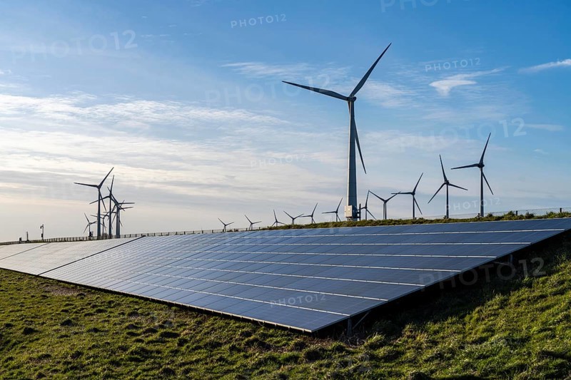 Solar park on the Slaperdijk dyke near the Eemshaven, test project, 17, 000 solar modules were installed over a good 5 kilometres, the Netherlands has over 22, 000 kilometres of dyke line, here it is being tested whether such an installation is successful and can be expanded, wind farm, Groningen, Netherlands