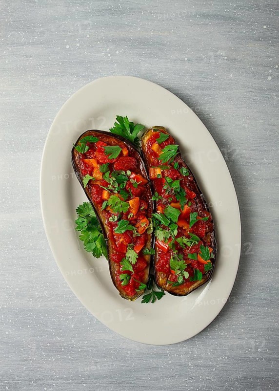 Traditional Turkish dish, Imam Bayildi, stuffed eggplant, with tomatoes and herbs, baked, no people, homemade