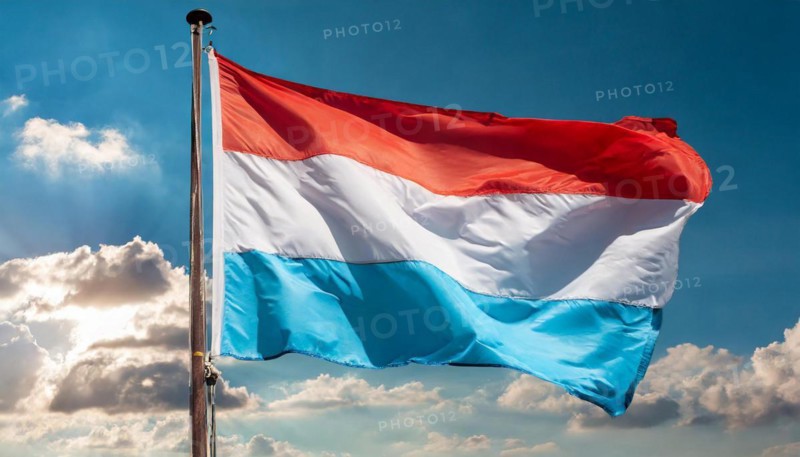 Flags, the national flag of Luxembourg flutters in the wind