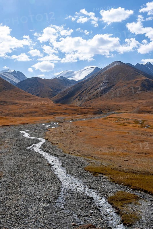 Burkhan valley with river, mountain landscape with glaciated peaks and golden meadows, Terskey Ala-Too, Tien Shan, Issyk Kul province, Kyrgyzstan, Asia
