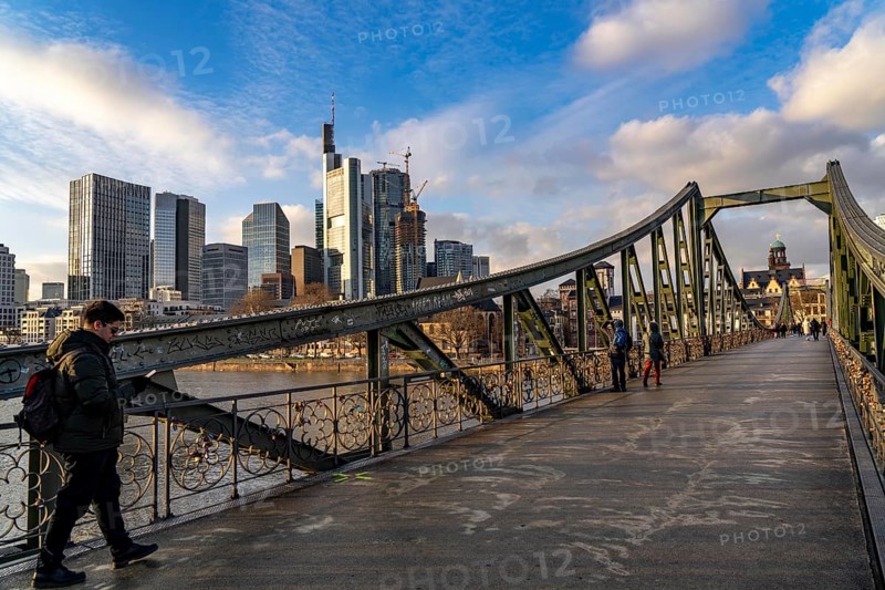Skyline of the city centre of Frankfurt am Main, river Main, Eiserner Steg bridge, dusk, Hesse, Germany, Europe