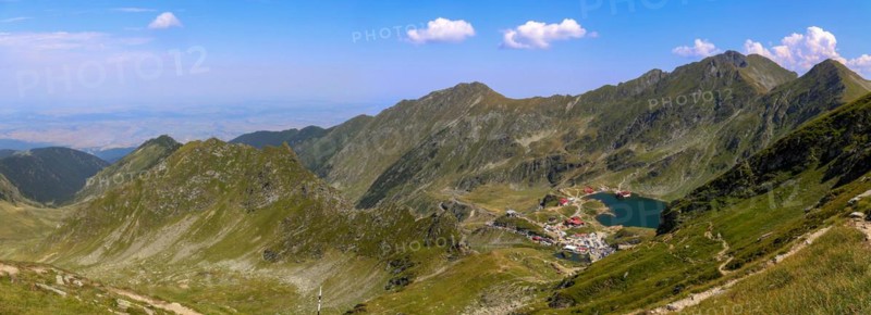Romania: Lake Balea (Romanian: Balea Lac) from above. The lake is located at the summit of the Transfogarasch High Road in the Fogarasch Mountains on the border between Transylvania and Wallachia and is a popular excursion destination