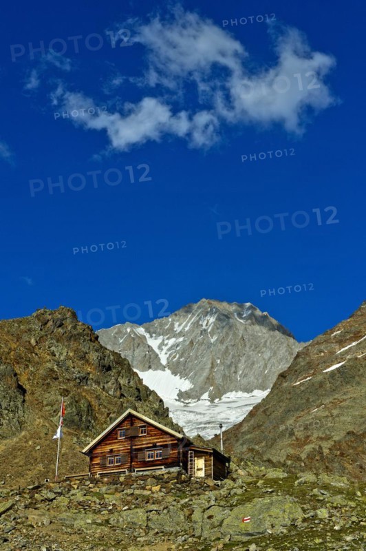 Bietschhorn hut of the Academic Alpine Club of Bern AACB, Bietschhorn summit at the rear, Lötschental, Valais, Switzerland, Europe