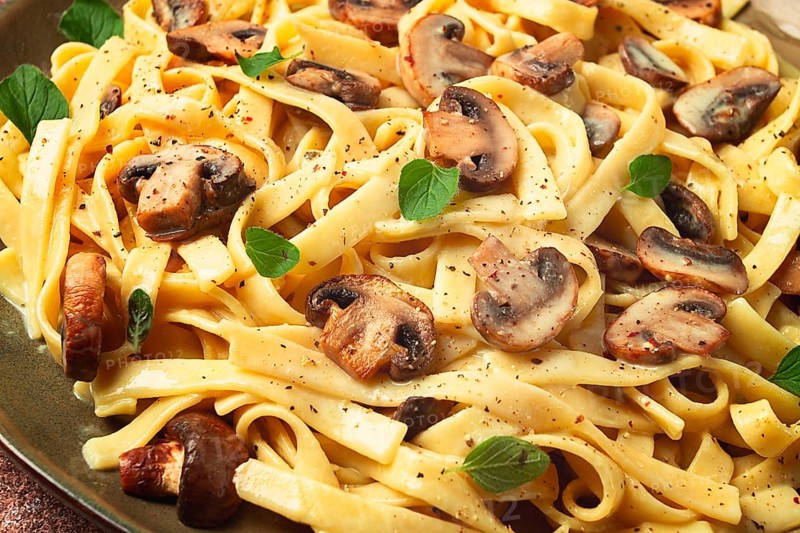 Fettuccine with champignons, basil, in cream sauce, homemade, no people